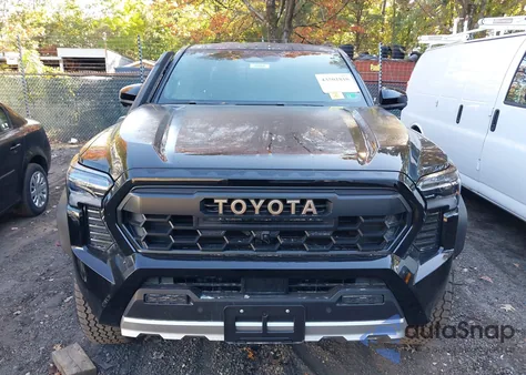 2025 Toyota Tacoma Hybrid Trailhunter from USA, damaged, VIN 3TYLC5LN0ST039894